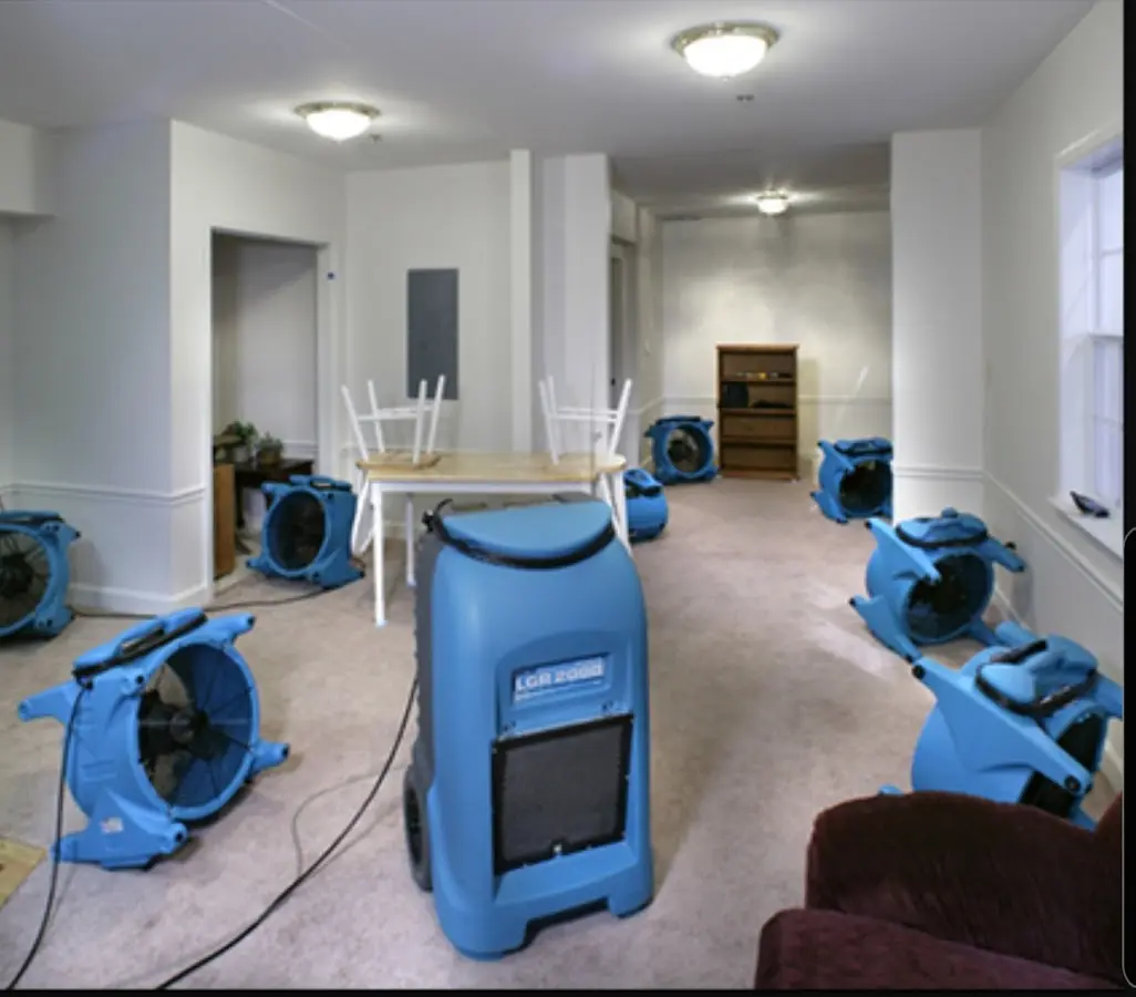 Air movers and dehumidifier setup for Water Extraction & Removal in Poland